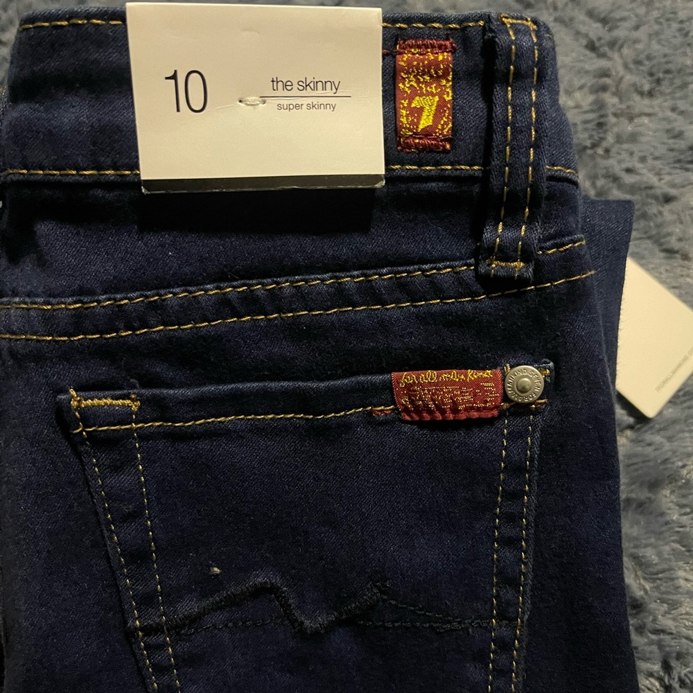 7 for all Mankind skinny blue jeans.